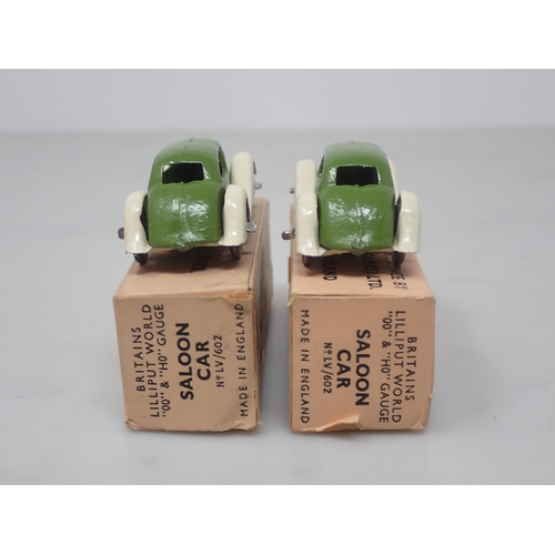 137 - Two boxed Britains Lilliput World LV/602 Saloon Cars, both green with original tissue packing