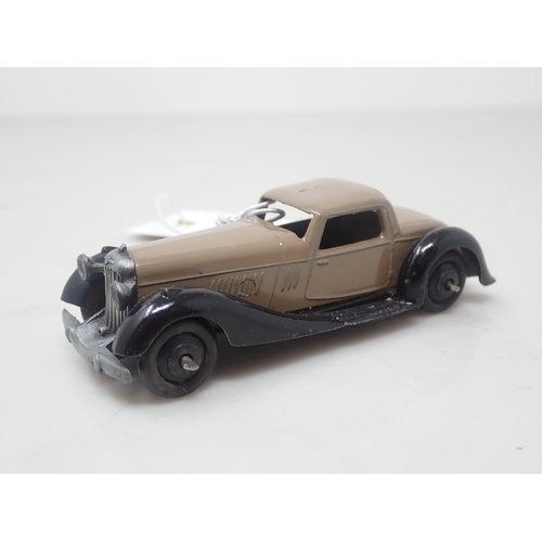 141 - A Dinky Toys No.36b light brown Bentley