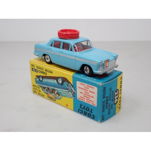 143 - A boxed Corgi Toys No.236 Austin A60 Motor School