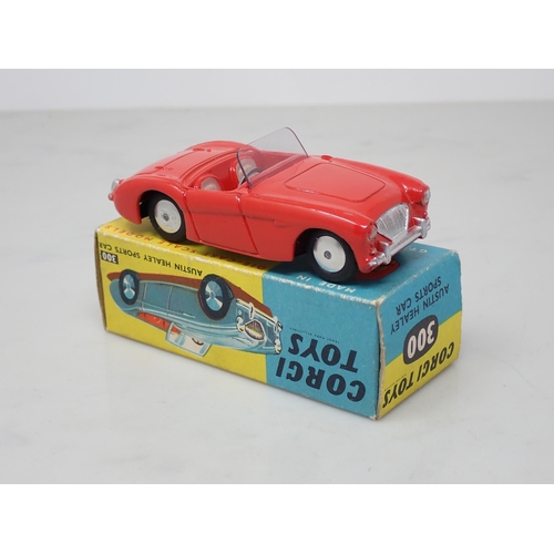 147 - A boxed Corgi Toys No.300 red Austin Healey Sports Car