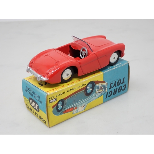 147 - A boxed Corgi Toys No.300 red Austin Healey Sports Car