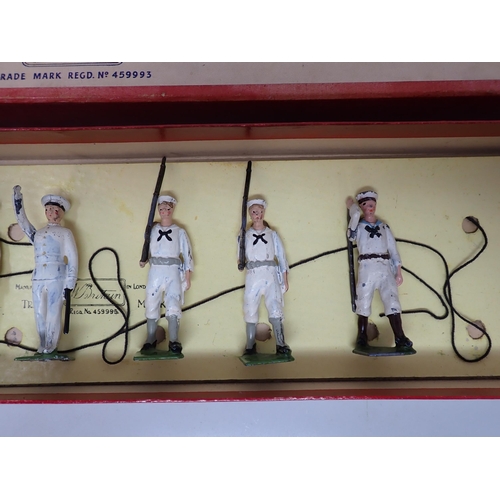 159 - A boxed Set of Britains No.1253 Whitejackets marching with officer, string present, figures and box ... 