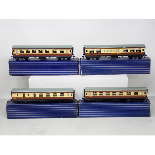 16 - Hornby-Dublo 4x W.R. tinplate Coaches 3x D21/ 1x D20, near mint and boxed
Coaches comprise of 2x D21... 