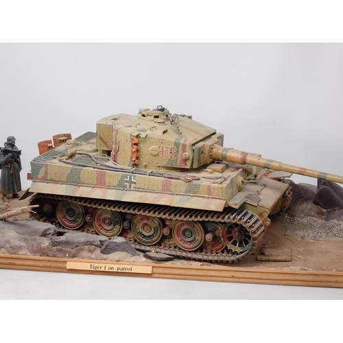 161 - A large kit built diecast Diorama of a German Tiger 1 Tank on patrol with Infantry 2ft 3in L