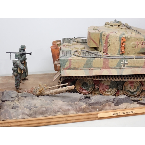 161 - A large kit built diecast Diorama of a German Tiger 1 Tank on patrol with Infantry 2ft 3in L