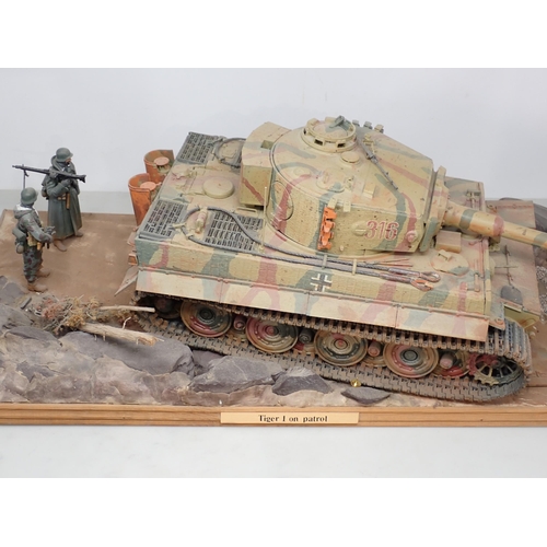 161 - A large kit built diecast Diorama of a German Tiger 1 Tank on patrol with Infantry 2ft 3in L