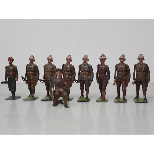 163 - Twenty Britains diecast Figures of Zulus and Zulu Wars period British Soldiers with stretcher bearer... 