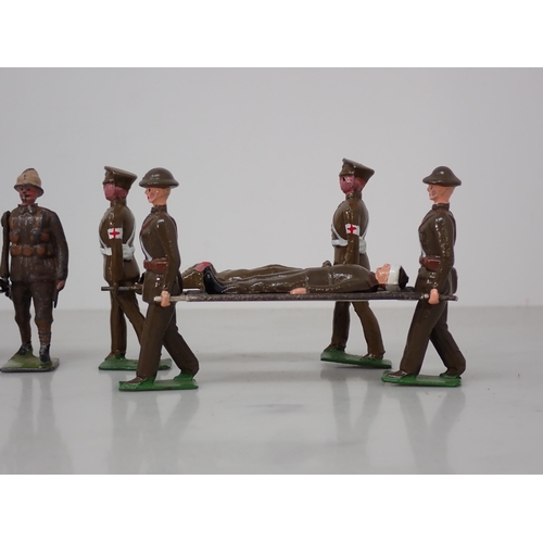 163 - Twenty Britains diecast Figures of Zulus and Zulu Wars period British Soldiers with stretcher bearer... 