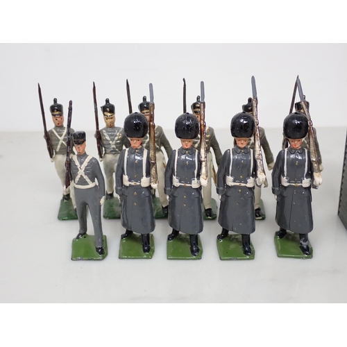 165 - Twenty Britains Figures of Guardsmen of British Regiments and a Sentry Box, generally Ex