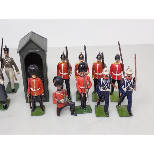 165 - Twenty Britains Figures of Guardsmen of British Regiments and a Sentry Box, generally Ex