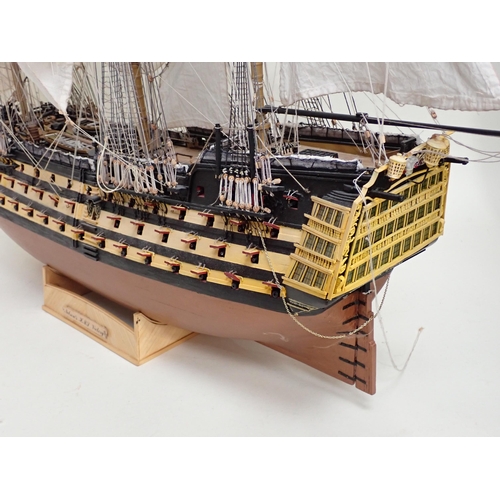 180 - A kit built wooden Model of HMS 'Victory' 4ft L x 2ft 100in H