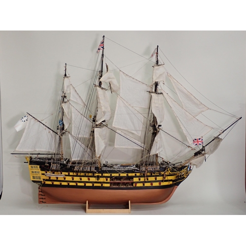 180 - A kit built wooden Model of HMS 'Victory' 4ft L x 2ft 100in H