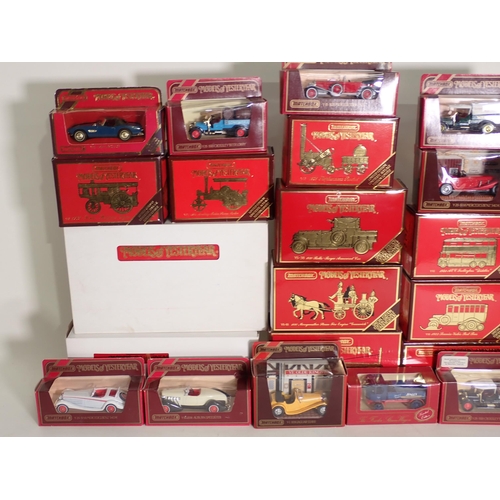 189 - Twenty two boxed Matchbox Models of Yesteryear, Cadburys Model Ford T, and a Corgi Classics