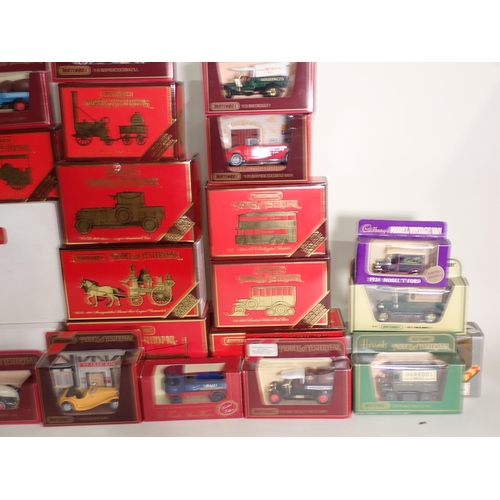 189 - Twenty two boxed Matchbox Models of Yesteryear, Cadburys Model Ford T, and a Corgi Classics