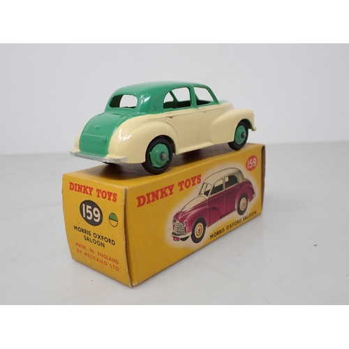 201 - A boxed Dinky Toys No.159 cream and green Morris Oxford