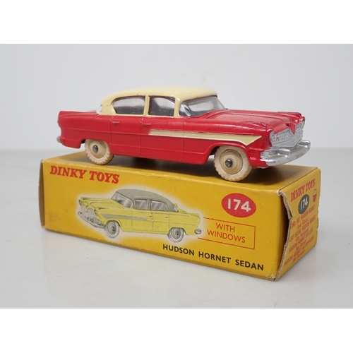 204 - A boxed Dinky Toys No.174 red and cream Hudson Hornet Sedan