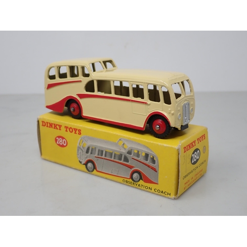 208 - A boxed Dinky Toys No.280 cream Observation Coach