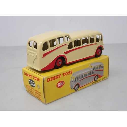 208 - A boxed Dinky Toys No.280 cream Observation Coach