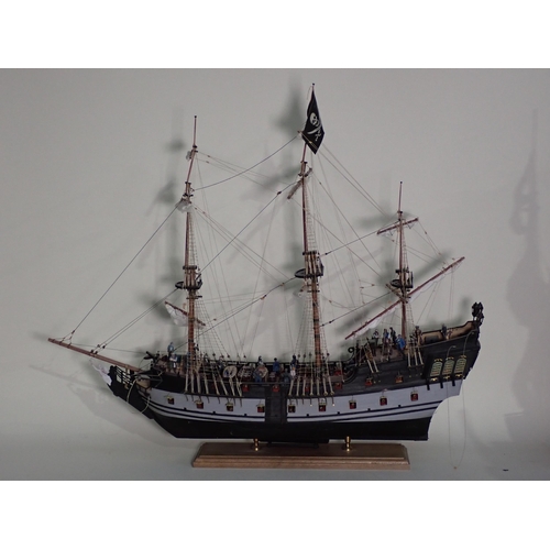 220 - A kit built wooden Model of the 'Black Pearl' and two cut away sections of Warships