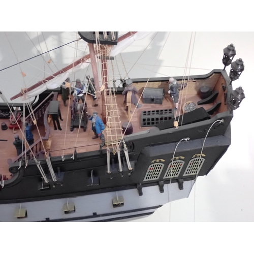 220 - A kit built wooden Model of the 'Black Pearl' and two cut away sections of Warships