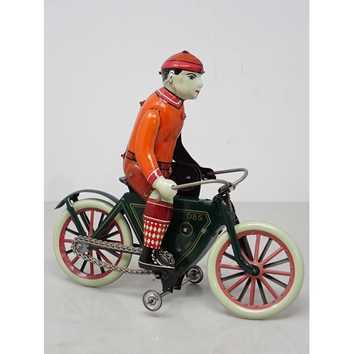 248 - A boxed DBS Rolli 230 tinplate Cyclist