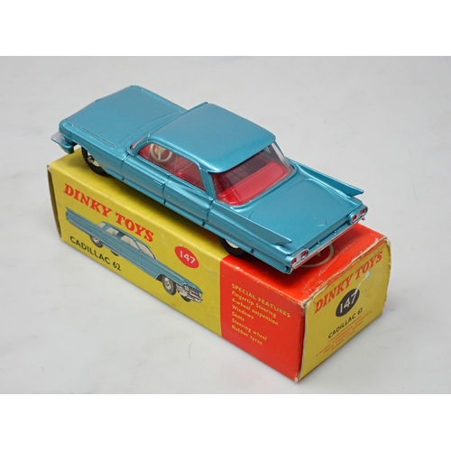 258 - A boxed Dinky Toys No.147 Cadillac 62 with red interior