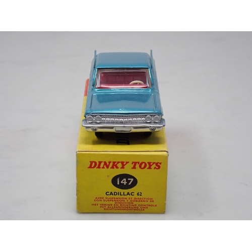 258 - A boxed Dinky Toys No.147 Cadillac 62 with red interior