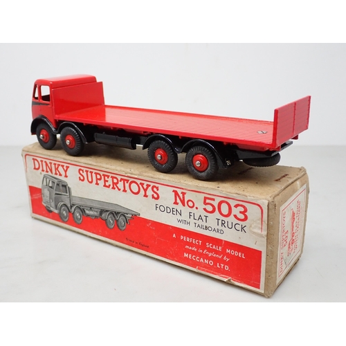 263 - A boxed Dinky Toys No.503 red and black Foden Flat Truck with tailboard