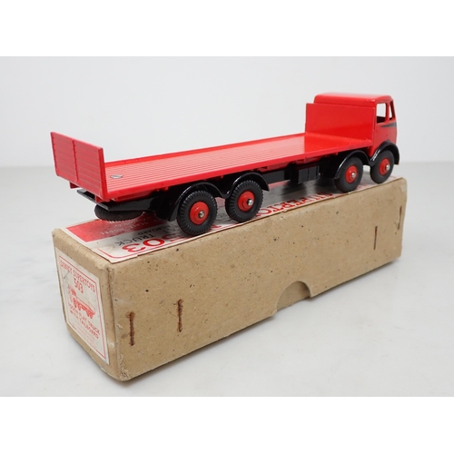 263 - A boxed Dinky Toys No.503 red and black Foden Flat Truck with tailboard