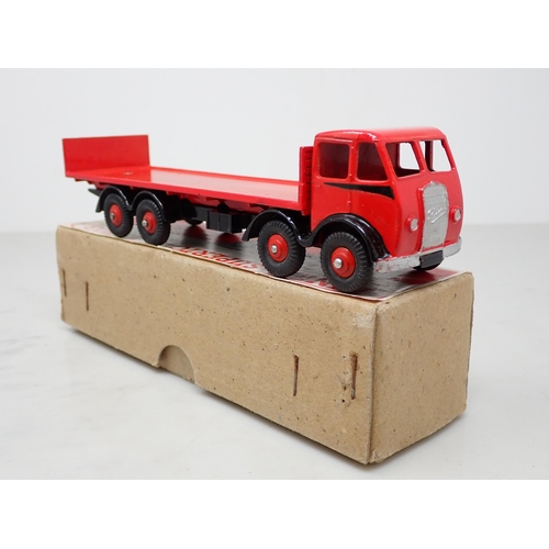 263 - A boxed Dinky Toys No.503 red and black Foden Flat Truck with tailboard