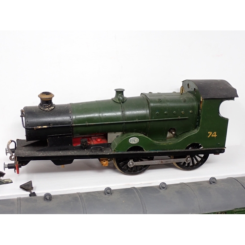 319 - Three scratch built 0 gauge clockwork Locomotives with assorted Tenders, a Cattle Wagons and a Bogie... 