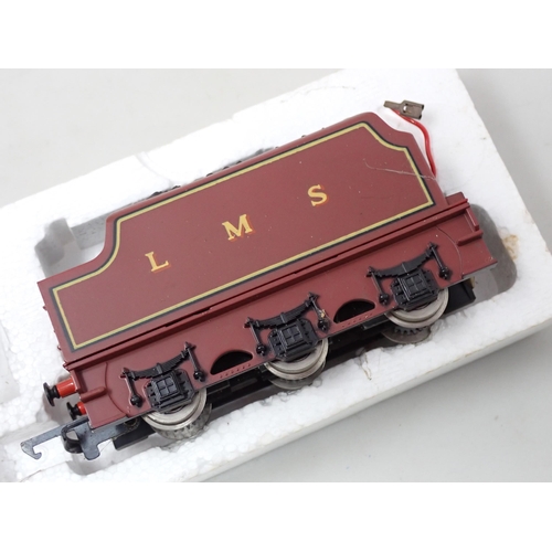 320 - A boxed Hornby 00 gauge L.M.S. Class 5 Locomotive, a Hornby 'Mallard' in incorrect box and a boxed '... 