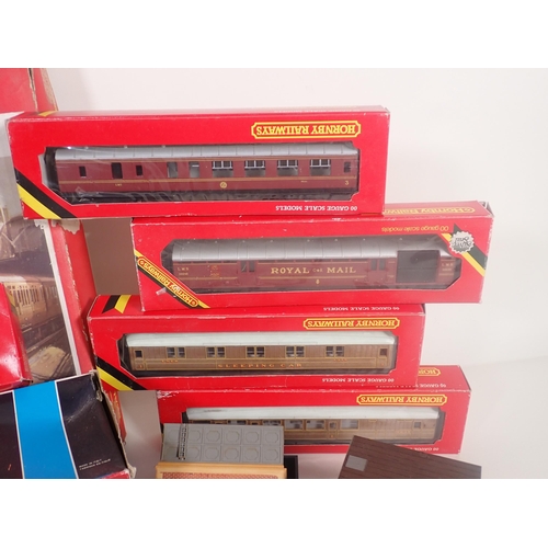 321 - A Hornby 'Flying Scotsman' Set in damaged box, five boxed Hornby Coaches, a boxed Lima Station and a... 