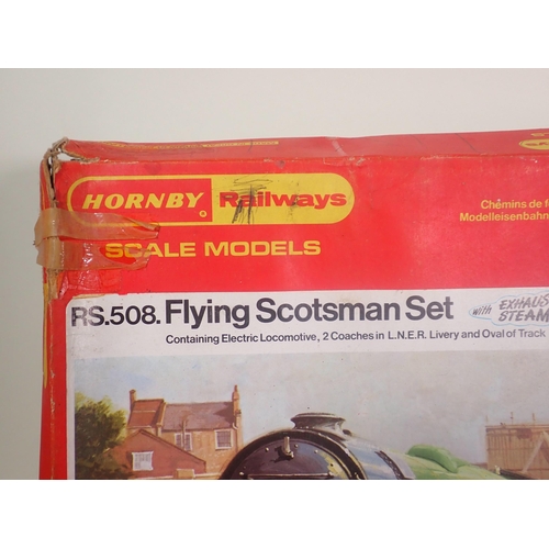 321 - A Hornby 'Flying Scotsman' Set in damaged box, five boxed Hornby Coaches, a boxed Lima Station and a... 