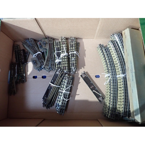 324 - Three boxes of Hornby-Dublo 3-rail Coaches, Wagons, Track and other Controllers