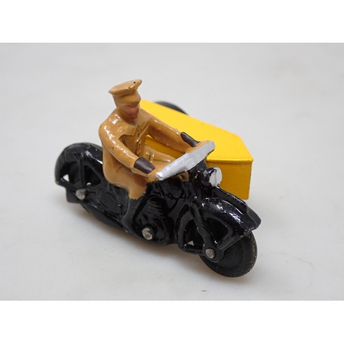 343 - A Dinky Toys No.270 A.A. Motor Cycle Patrol Trade Box containing one model