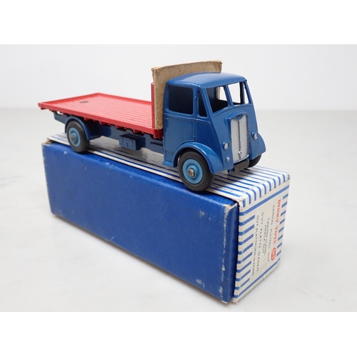 344 - A boxed Dinky Toys No.512 blue and red Guy Flat Truck