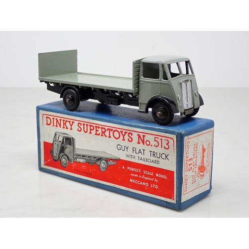 345 - A boxed Dinky Toys No.513 black and grey Guy Flat Truck