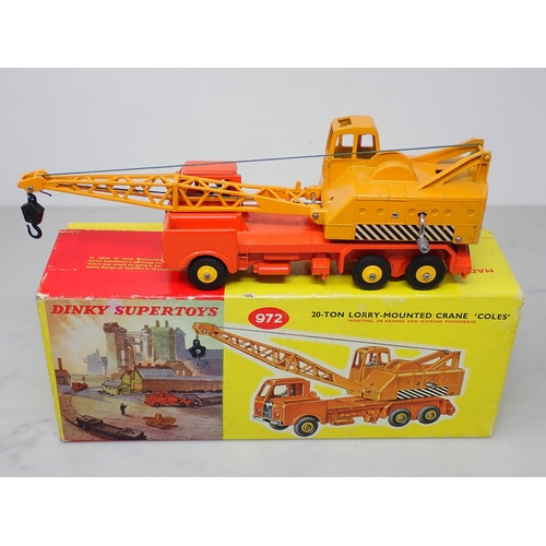 352 - A rare late production Dinky Toys No.972 Lorry Mounted Crane, plastic hubs and winding handles, one ... 