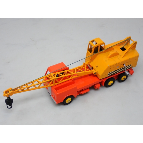 352 - A rare late production Dinky Toys No.972 Lorry Mounted Crane, plastic hubs and winding handles, one ... 