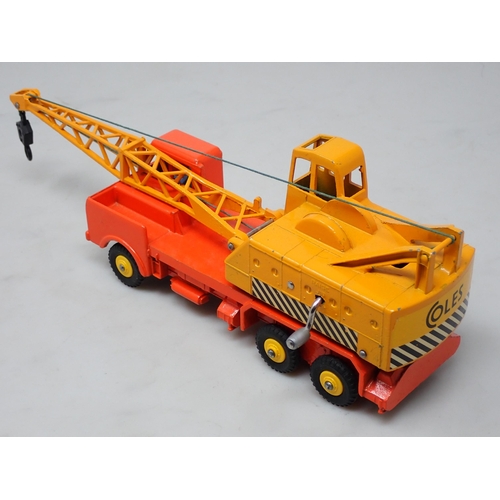 352 - A rare late production Dinky Toys No.972 Lorry Mounted Crane, plastic hubs and winding handles, one ... 