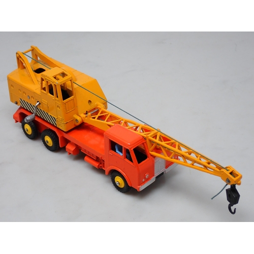 352 - A rare late production Dinky Toys No.972 Lorry Mounted Crane, plastic hubs and winding handles, one ... 