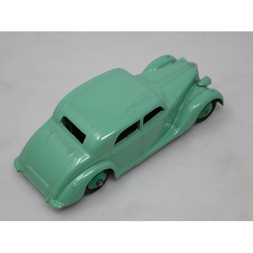 364 - An unboxed Dinky Toys No.40A pale green Riley