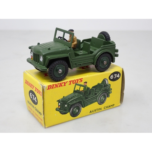 376 - A boxed Dinky Toys No.674 late production Austin Champ with plastic hubs, driver and steering wheel