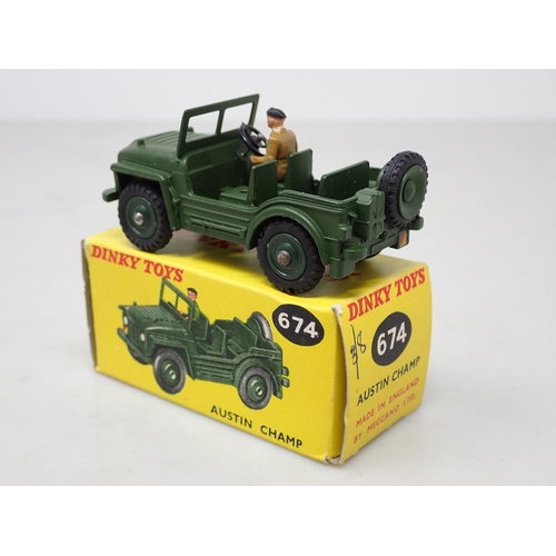 376 - A boxed Dinky Toys No.674 late production Austin Champ with plastic hubs, driver and steering wheel