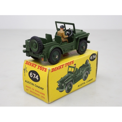 376 - A boxed Dinky Toys No.674 late production Austin Champ with plastic hubs, driver and steering wheel