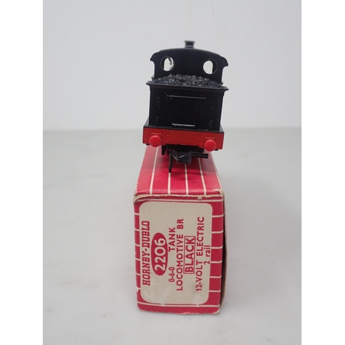 38 - Hornby-Dublo rare 2206 0-6-0 Tank, red plastic buffers, mint, boxed with literature
The black tank i... 