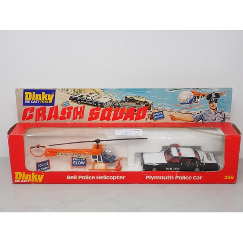 382 - A boxed Dinky Toys No.299 Police Crash Squad and a boxed No.304 Fire Rescue Set