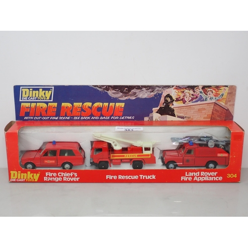 382 - A boxed Dinky Toys No.299 Police Crash Squad and a boxed No.304 Fire Rescue Set