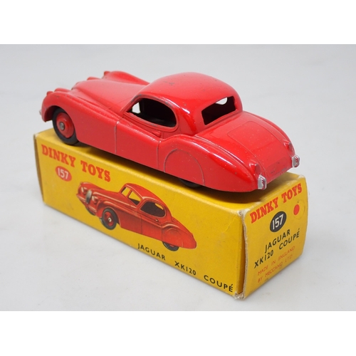 384 - A boxed Dinky Toys No.157 red Jaguar XK120 Coupe